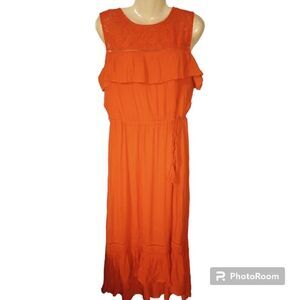 - AGB orange sleeveless high low dress with tassel belt and ruffle accents